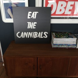 "Eat the cannibals" wall art sign 50x50cm